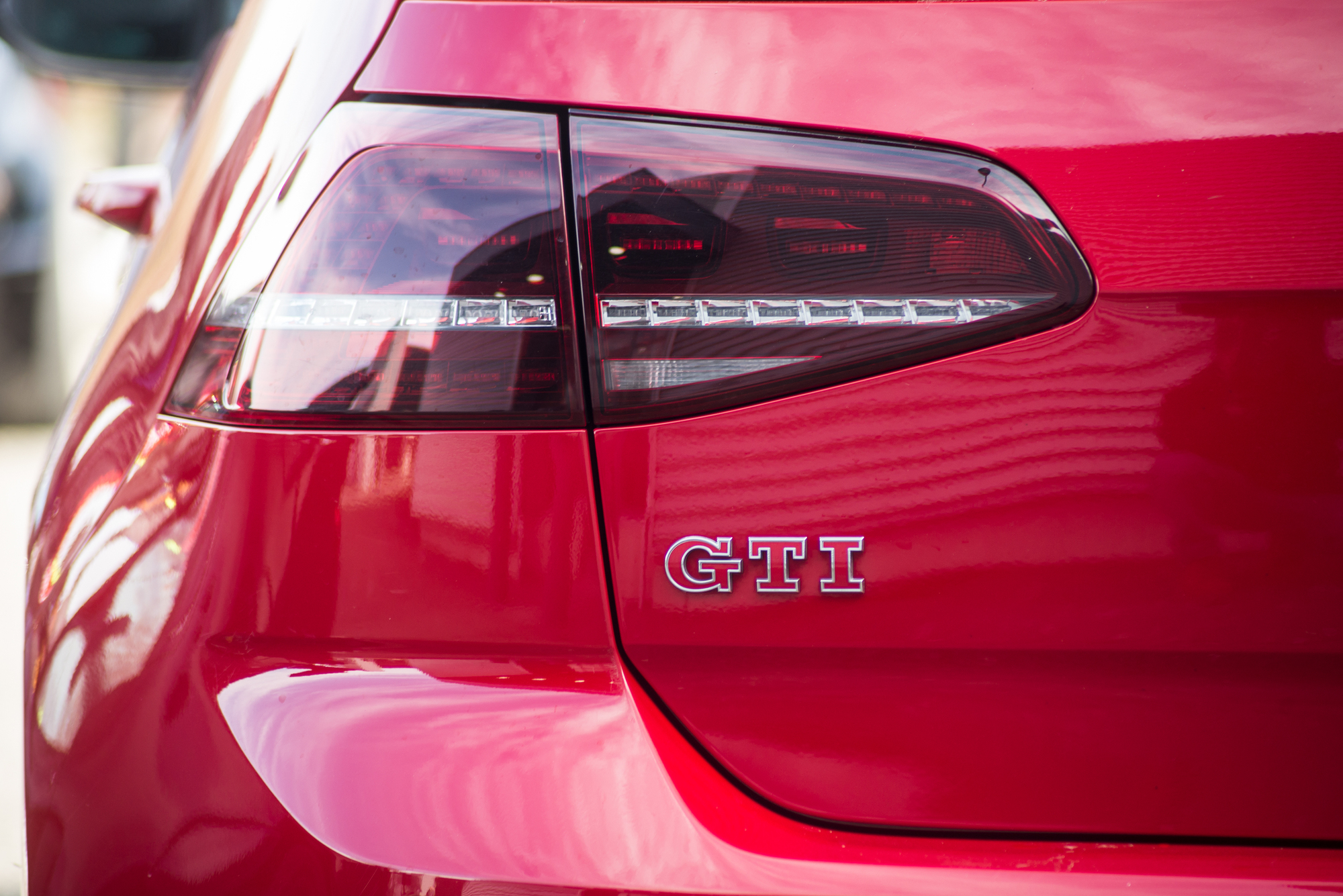 Mulhouse - France - 8 March 2020 - rear view of red Volkswagen Golf GTI parked in the street